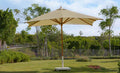 Beige patio umbrella with round canopy and central pole