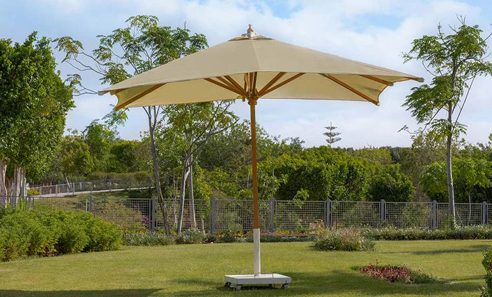 Beige patio umbrella with round canopy and central pole