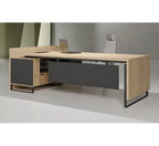 Light wood L-shape desk with dark panel interior, cable tray, and open side cabinet