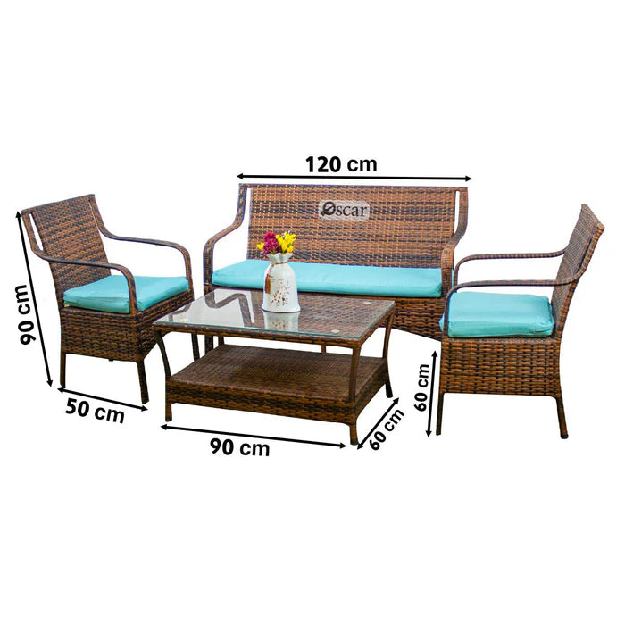 Rattan patio seating set with teal cushions, loveseat and two chairs, coffee table