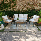 Rattan outdoor seating set with four armchairs, loveseat, round glass table, white cushions