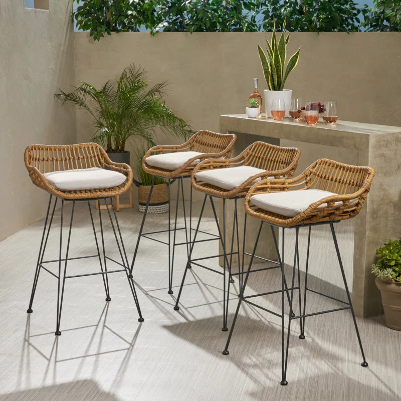 Set of 4 rattan bar chairs with white cushions and black metal legs