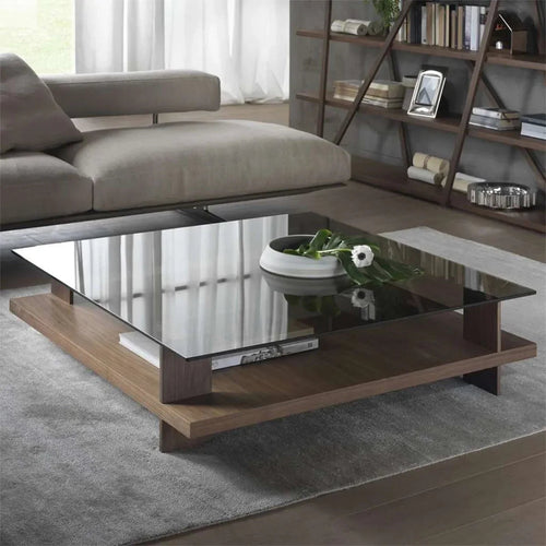 Rectangular coffee table with glass top and dark brown MDF base, open lower shelf