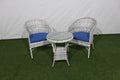 3-piece outdoor set with two wicker armchairs and round glass side table, blue cushions