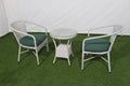 Outdoor patio 3-piece set with two armchairs, round side table, and green cushions