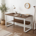 Modern office desk with dark wood top, white metal frame, open side shelves
