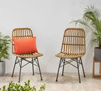 Set of 2 beige rattan cafe chairs, black metal legs, with orange seat cushions