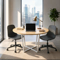 Round light wood meeting table with white cross-leg base