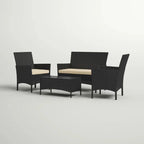 Black woven outdoor furniture set with three armchairs and a glass-top center table