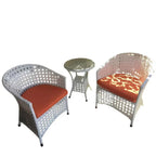 Outdoor patio furniture set: 2 armchairs, round side table, perforated white frame, orange cushions