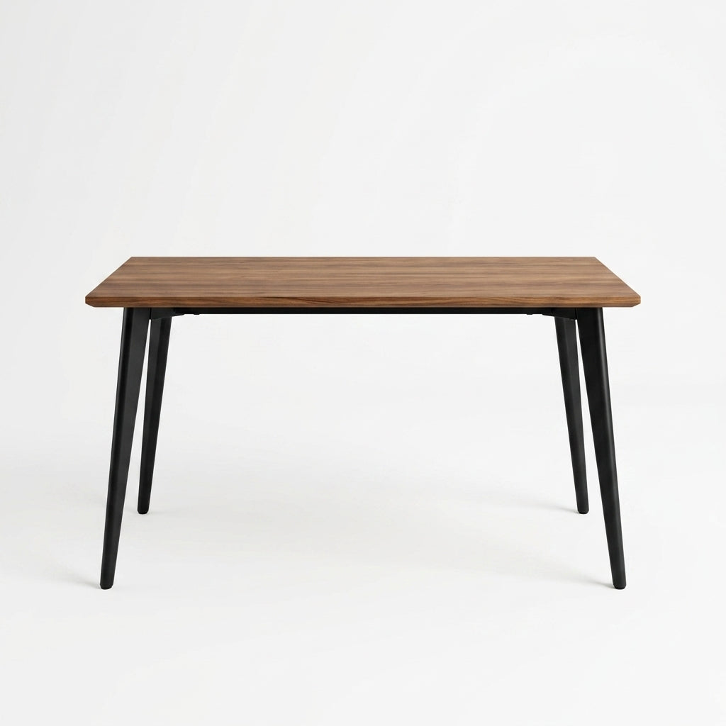 Wooden table with black legs on a white background