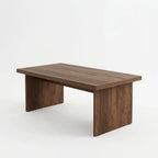 Brown MDF coffee table with rectangular top and two side panels, simple legs
