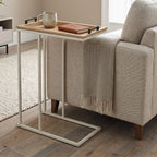 Rectangular light wood side table with black corner handles and white metal frame