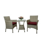 Outdoor furniture set: 2 woven armchairs with red cushions and rectangular glass-top table