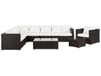 Outdoor 5-piece lounge set: dark wicker sofa, armchair, side chair, white cushions, table
